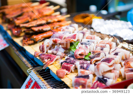 Fresh squid on wooden skewer 36949123
