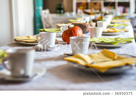 Beautiful festive dinner table colorful yellow Beautiful festive dinner table colorful yellow 36950375