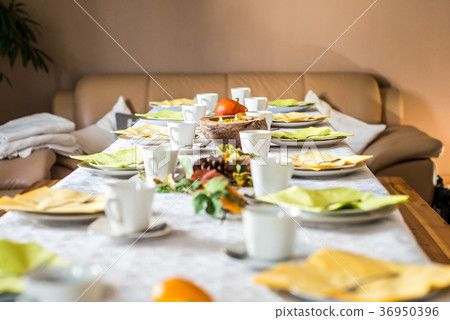 Beautiful festive dinner table colorful yellow Beautiful festive dinner table colorful yellow 36950396
