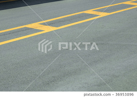 Yellow marking on the road. Copy space. Yellow marking on the road. Copy space. 36953896