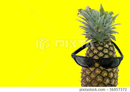 Pineapple wearing sunglasses. 36957372