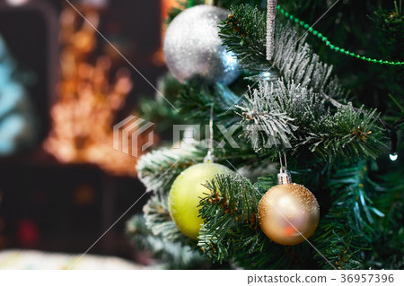 Decorated christmas tree with balls and light. Decorated christmas tree with balls and light. 36957396