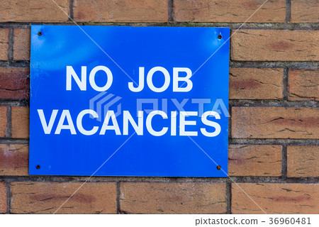 No Jobs Blue Advert Sign On Brick Wall No Jobs Blue Advert Sign On Brick Wall 36960481