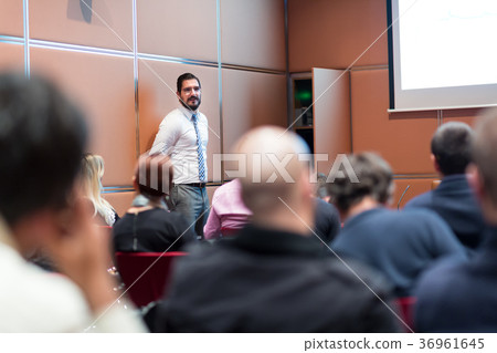 Speaker Giving a Talk at Business Meeting. Speaker Giving a Talk at Business Meeting. 36961645