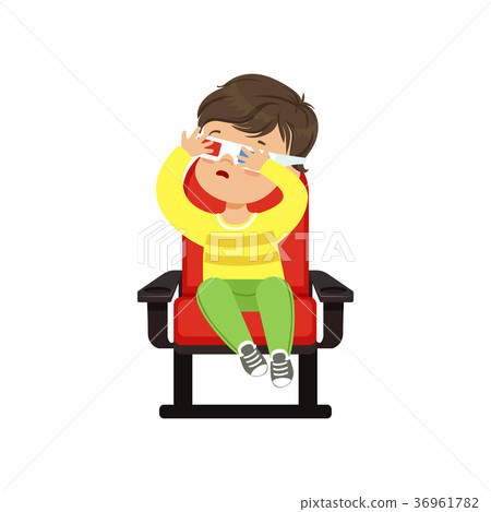 Frightened little boy in 3d glasses sitting on a 36961782