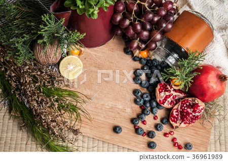 Healthy fruits and berries wooden board top view Healthy fruits and berries wooden board top view 36961989