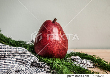 Healthy Fresh red pear, fabric and green leaf 36962002