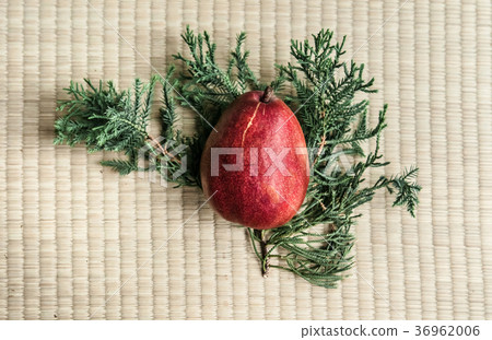 Fresh ripe red pear on pine leaf top view 36962006