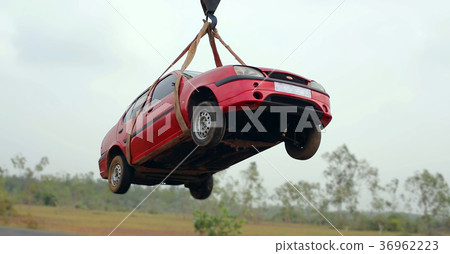 towing damaged car with a tow truck from the road. towing damaged car with a tow truck from the road. 36962223