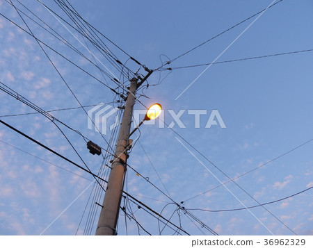 Telephone pole in evening Telephone pole in evening 36962329