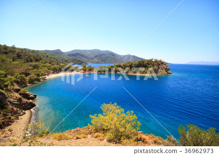 Beautiful beach with yacht Beautiful beach with yacht 36962973