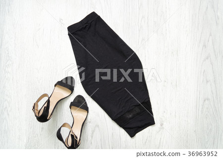 Black skirt and shoes. Fashionable concept Black skirt and shoes. Fashionable concept 36963952