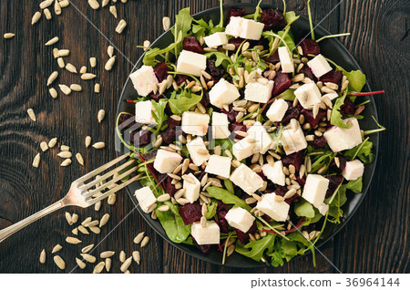 Healthy beetroot salad with feta cheese, arugula Healthy beetroot salad with feta cheese, arugula 36964144