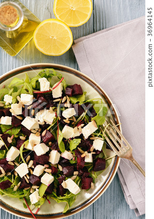 Healthy beetroot salad with feta cheese, arugula Healthy beetroot salad with feta cheese, arugula 36964145