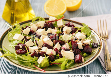 Healthy beetroot salad with feta cheese, arugula Healthy beetroot salad with feta cheese, arugula 36964146