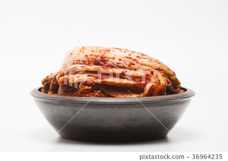 Kimchi on a crock head dish isolated Kimchi on a crock head dish isolated 36964235