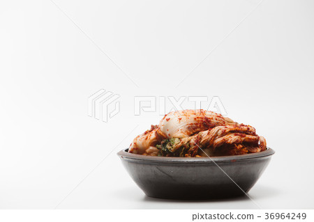 Kimchi on a crock head dish isolated Kimchi on a crock head dish isolated 36964249