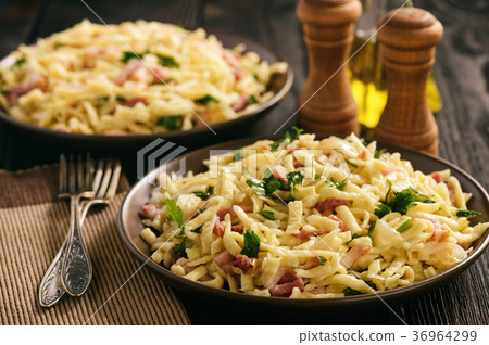 Spaetzle with bacon and onion,german style cuisine 36964299