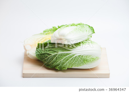 Cabbage on cutting board isolated 36964347