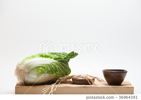 Cabbage with rice on wood bowl. 36964391