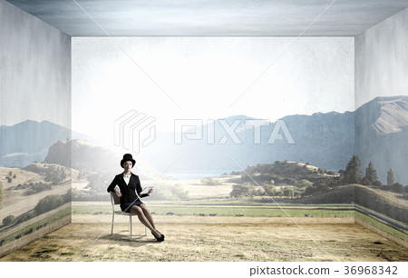 Girl in black cylinder 36968342