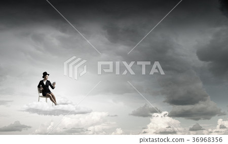 Girl in black cylinder Girl in black cylinder 36968356