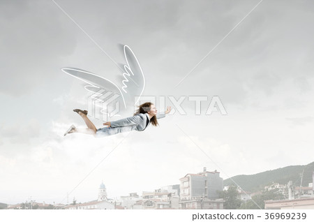 Woman flying high Woman flying high 36969239