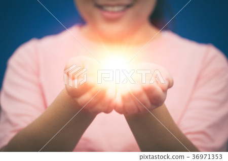 Girl Giving Miracle or Hope in her Hands concept Girl Giving Miracle or Hope in her Hands concept 36971353
