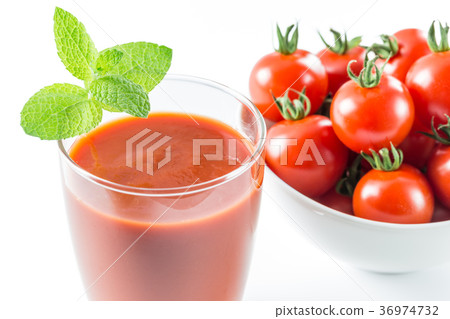 Ripe cherry tomatoes and tomato juice Ripe cherry tomatoes and tomato juice 36974732