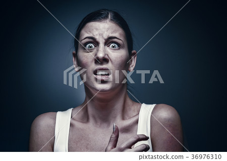 Close up portrait of a crying woman with bruised Close up portrait of a crying woman with bruised 36976310