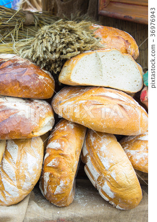 图库照片: freshly baked traditional loaves of rye bread