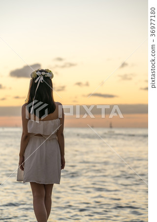 Woman looking at the sea 36977180