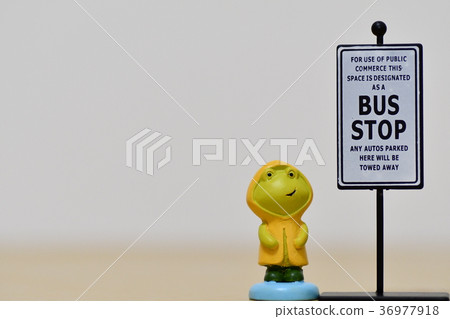 Bus stop and frog 36977918