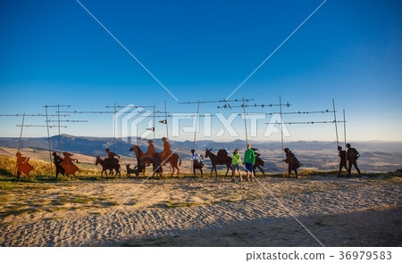 Silhouettes of pilgrims 36979583