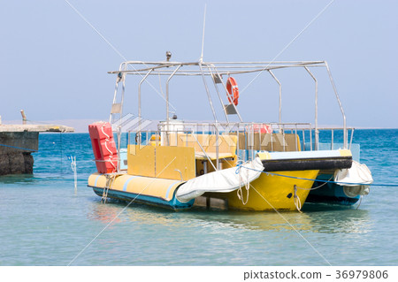 Boat and pier 36979806