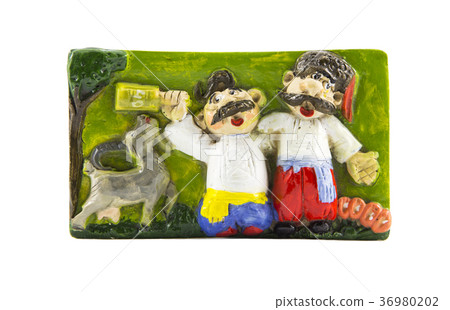 Ukrainian souvenir, a plate on a white background Ukrainian souvenir, a plate on a white background 36980202