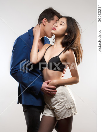 Portrait of a Teenage Couple Embracing. 36980254