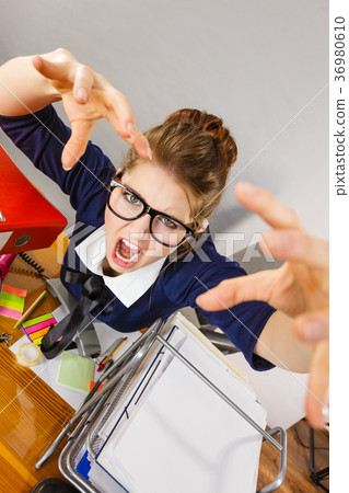 Angry mad bossy businesswoman being furious 36980610