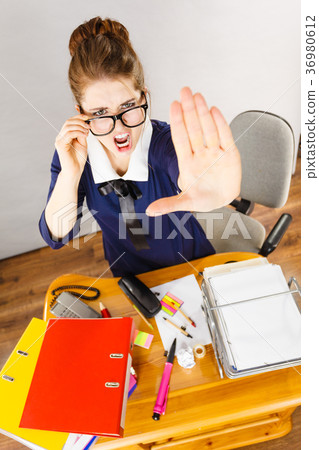 Angry mad bossy businesswoman being furious 36980612