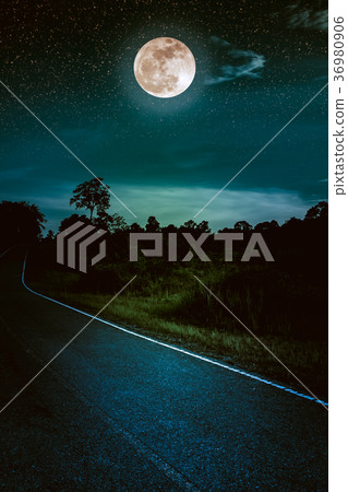 Dark sky with full moon and roadway. Dark tone. 36980906