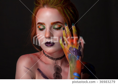 Portrait of a beautiful woman with a creative style Portrait of a beautiful woman with a creative style 36983279