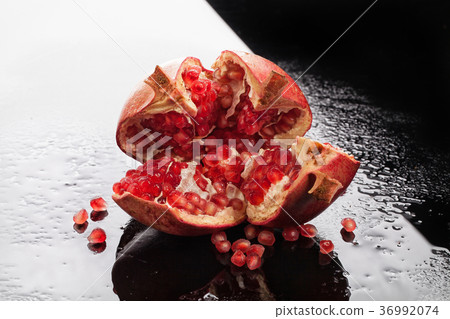 Pomegranate On A Glass Background 36992074