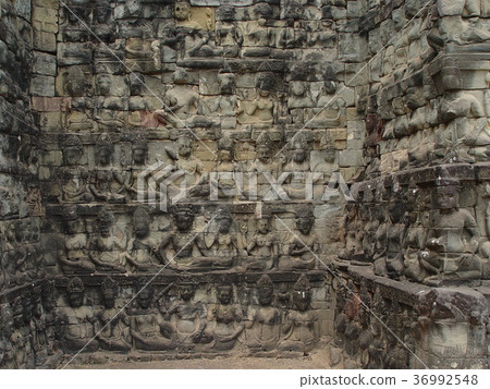 Wall sculpture (Terrace of the Leper King, Angkor Thom ruins, Siem Reap, Cambodia) Wall sculpture (Terrace of the Leper King, Angkor Thom ruins, Siem Reap, Cambodia) 36992548