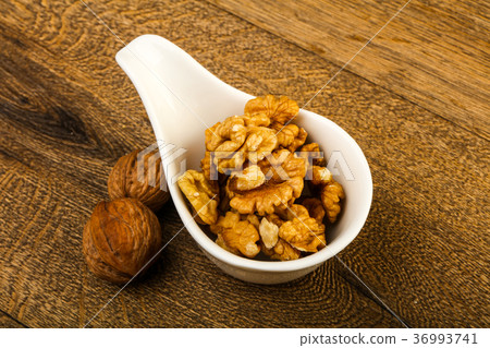 Opened walnuts Opened walnuts 36993741