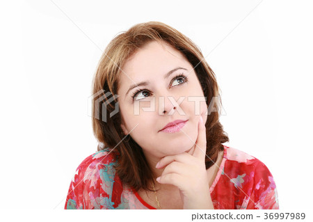 Closeup of an attractive young woman thinking Closeup of an attractive young woman thinking 36997989