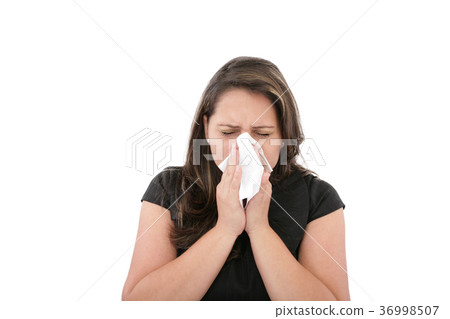 A woman with a cold or blowing her nose. A woman with a cold or blowing her nose. 36998507