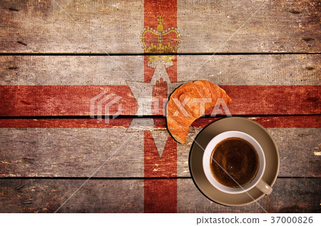 Cup of coffee with croissant and flag 37000826