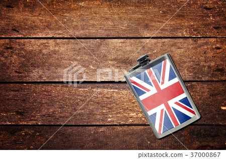 Alcohol flask on the table with flag 37000867