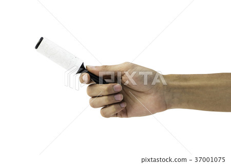 Hand holding sticky roller removing animal hair 37001075