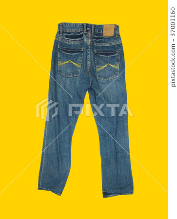 Casual jeans on yellow background 37001160